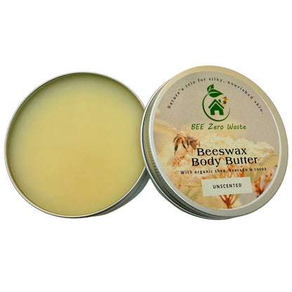 Lifestyle product photography of natural body butter on a wooden vanity with botanical ingredients.