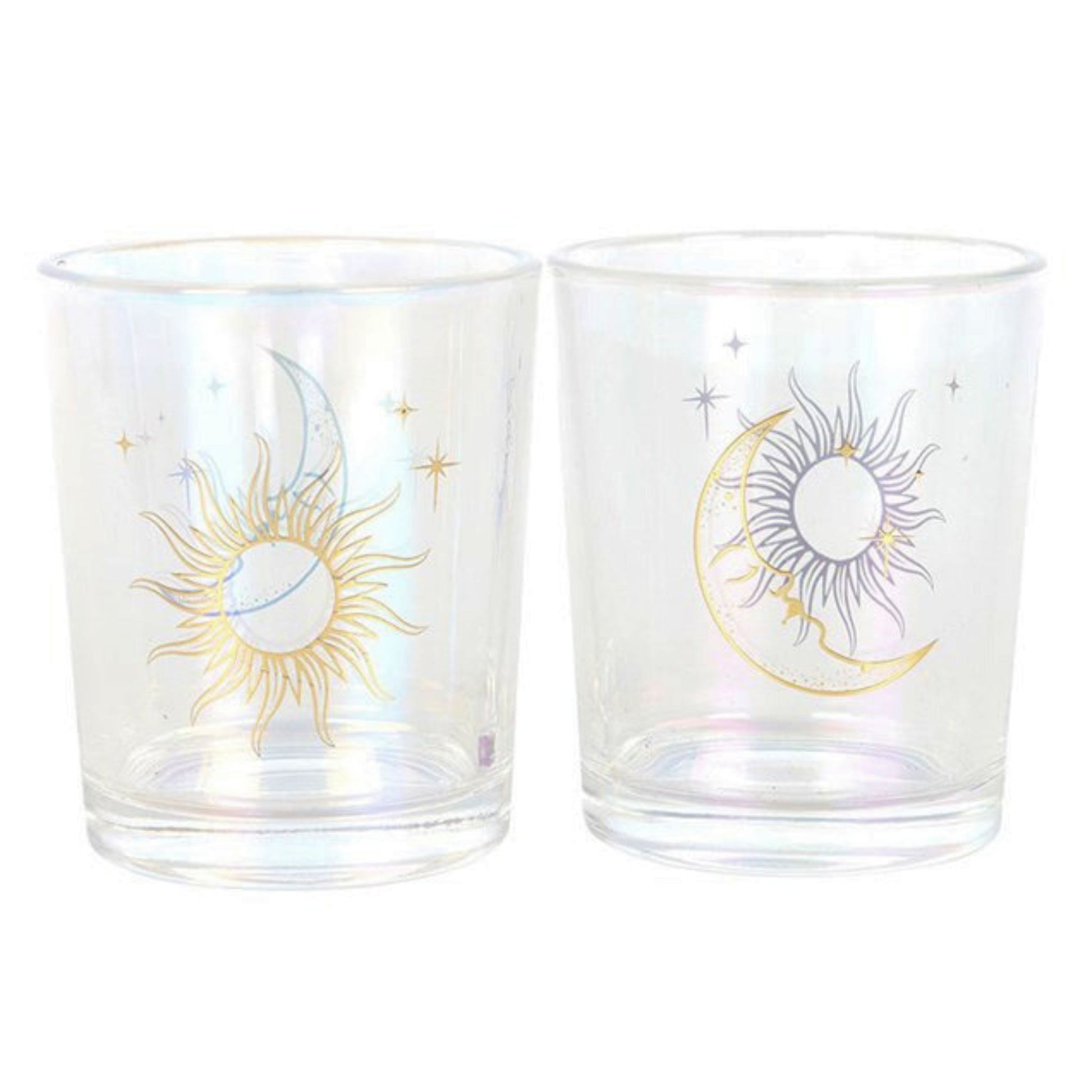 Two glass votive holders with sun and moon designs on a white background