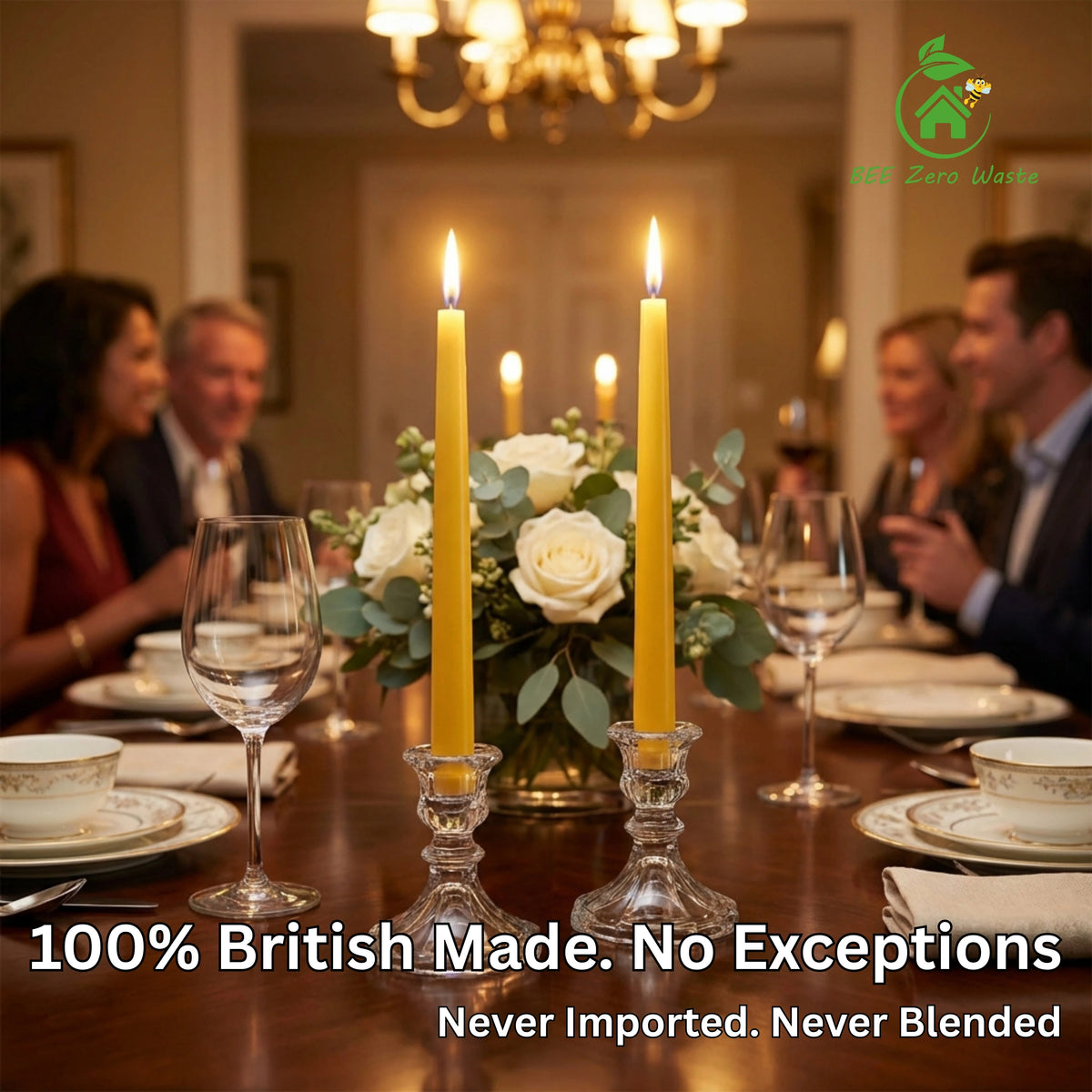 Artisan hand-dipped beeswax dinner candles illuminating a dark romantic dining table setting