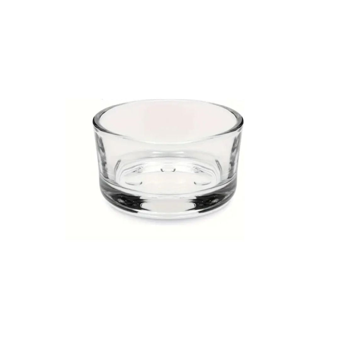 Clear glass candle holder on a white background